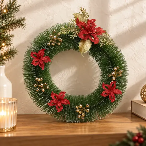 Christmas wreath with red flowers and gold leaves · Festive wreath product image