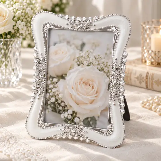 White photo frame with silver-tone wavy border · Silver-tone border detail