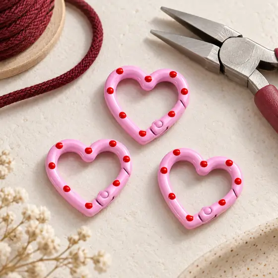 Pink heart spring clasp · Craft workbench scene