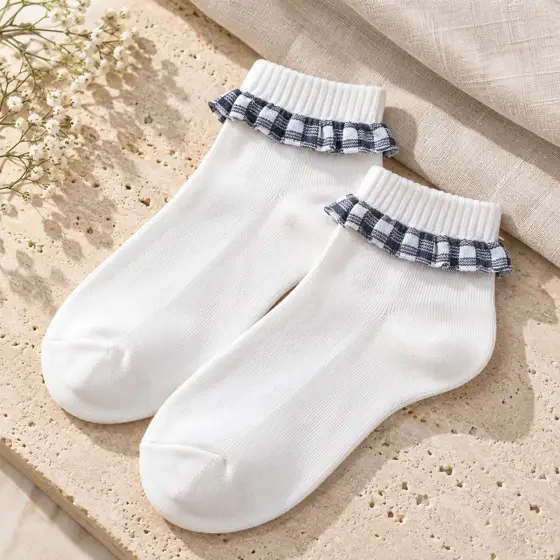 Gingham-trim socks · Product still life